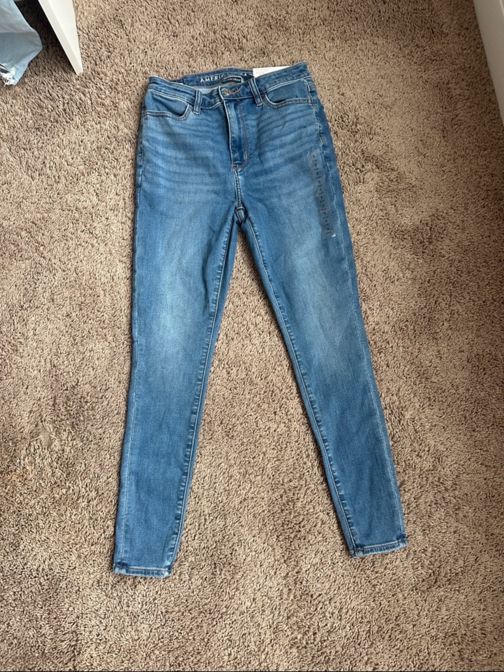 American Eagle Skinny Jeans in Light Blue Wash Next Level Stretch: 2 Short